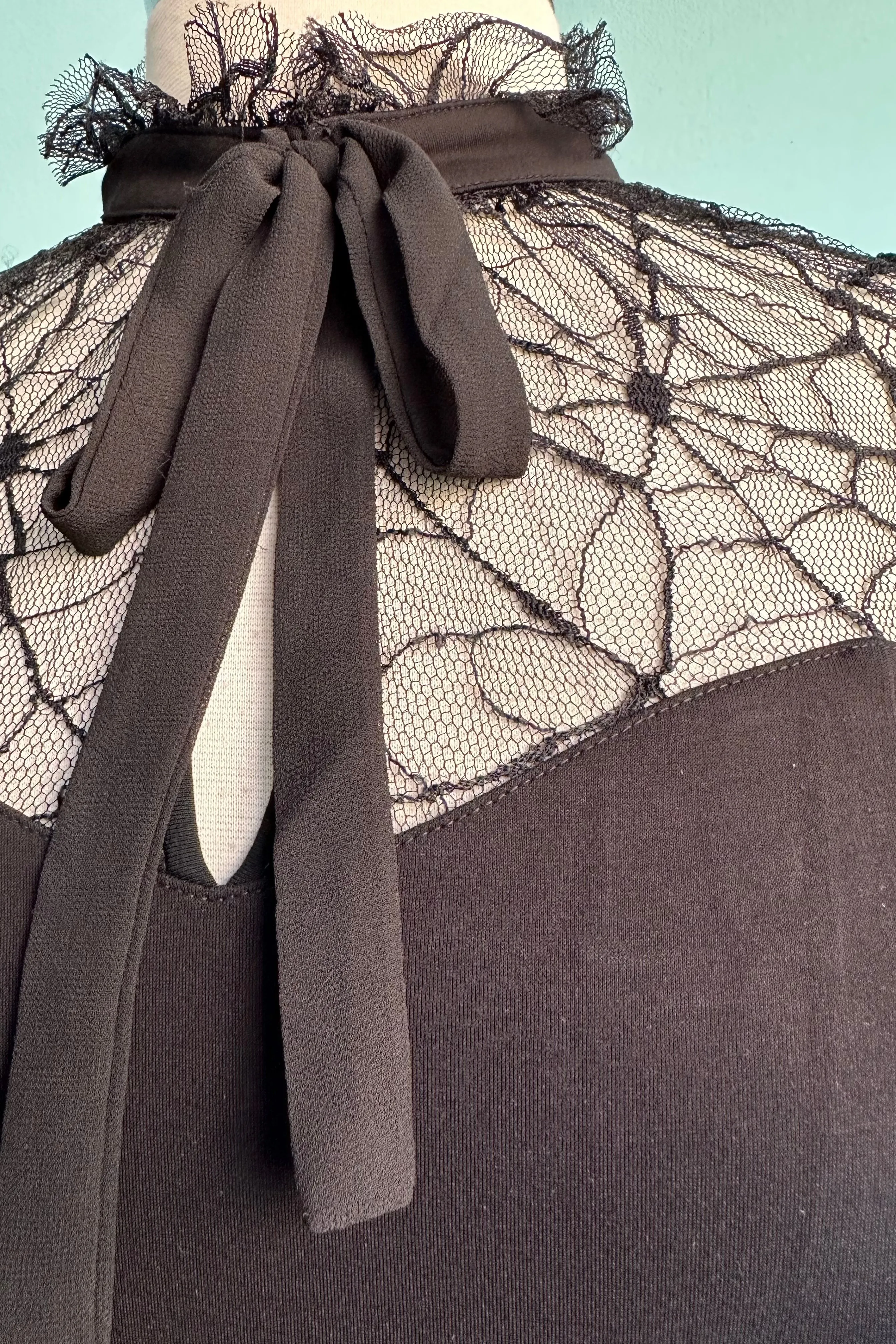 Black Web Lace Tie Neck Top by Voodoo Vixen